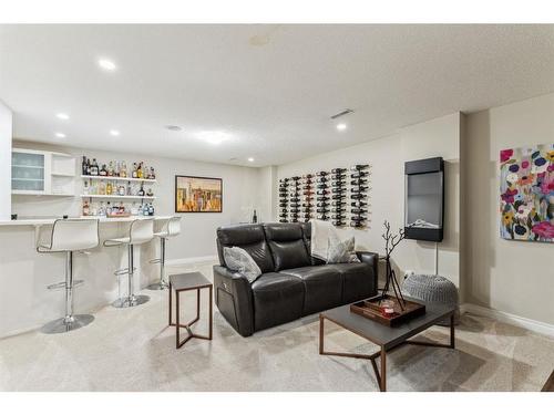 89 Somme Boulevard Sw, Calgary, AB - Indoor Photo Showing Living Room