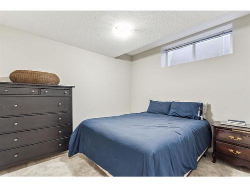 89 Somme Boulevard Sw, Calgary, AB - Indoor Photo Showing Bedroom