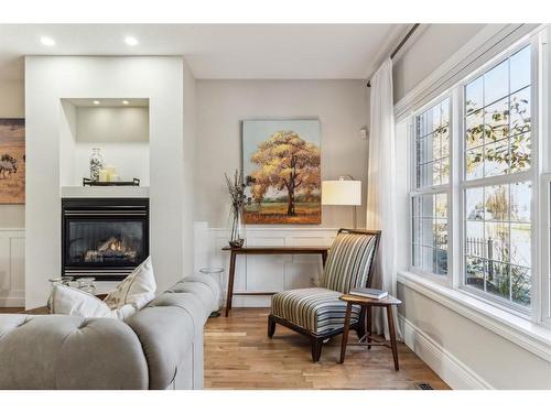 89 Somme Boulevard Sw, Calgary, AB - Indoor With Fireplace