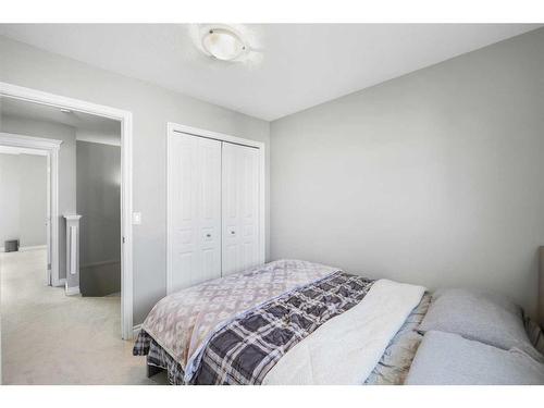 51 Crystal Shores Cove, Okotoks, AB - Indoor Photo Showing Bedroom