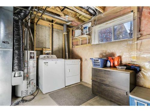 51 Crystal Shores Cove, Okotoks, AB - Indoor Photo Showing Laundry Room