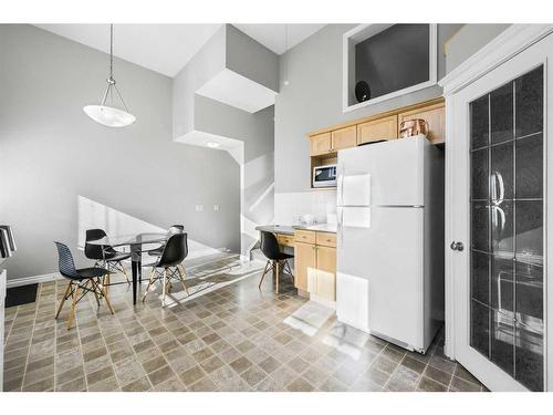 51 Crystal Shores Cove, Okotoks, AB - Indoor Photo Showing Kitchen