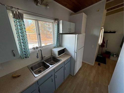 19A-333 Braxton Place Sw, Calgary, AB - Indoor Photo Showing Kitchen With Double Sink