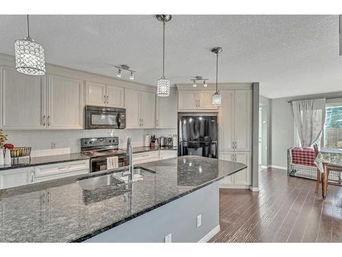 454 Auburn Crest Way Se, Calgary, AB - Indoor Photo Showing Kitchen With Double Sink With Upgraded Kitchen