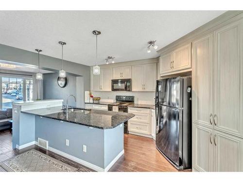 454 Auburn Crest Way Se, Calgary, AB - Indoor Photo Showing Kitchen With Upgraded Kitchen