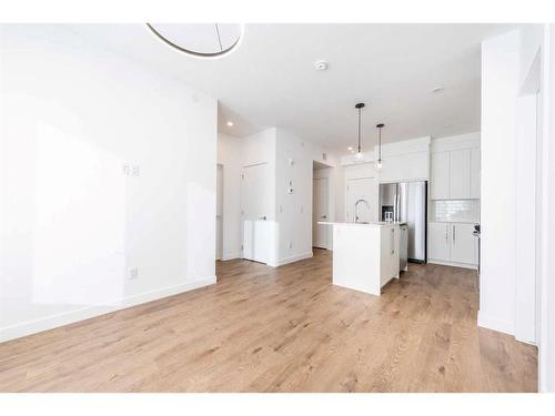 3407-111 Wolf Creek Drive Se, Calgary, AB - Indoor Photo Showing Kitchen