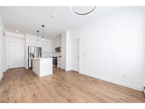 3407-111 Wolf Creek Drive Se, Calgary, AB - Indoor Photo Showing Kitchen