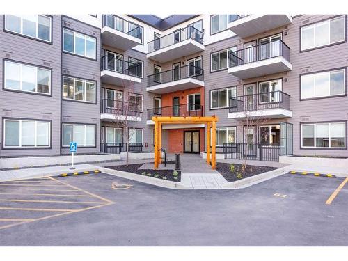 3407-111 Wolf Creek Drive Se, Calgary, AB - Outdoor With Balcony With Facade