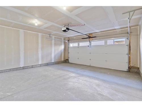 1604-280 Chelsea Road, Chestermere, AB - Indoor Photo Showing Garage