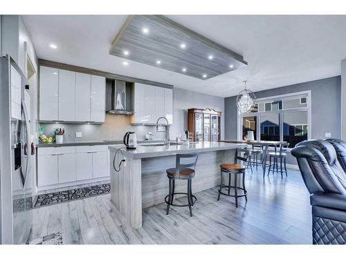 208 Bayview Street Sw, Airdrie, AB - Indoor Photo Showing Kitchen With Upgraded Kitchen