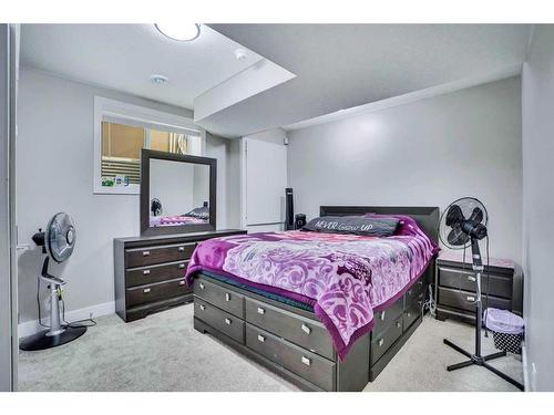 208 Bayview Street Sw, Airdrie, AB - Indoor Photo Showing Bedroom