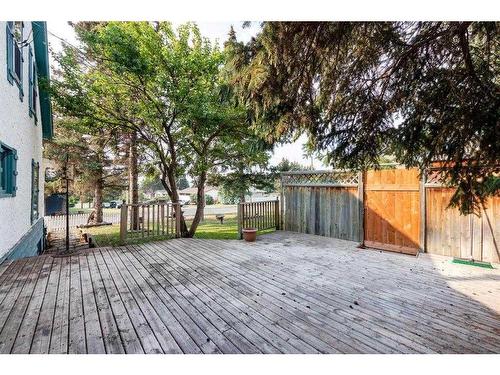 204 Baird Avenue, Cochrane, AB - Outdoor With Deck Patio Veranda