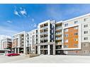 4211-4641 128 Avenue Ne, Calgary, AB  - Outdoor With Balcony With Facade 