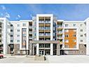 4211-4641 128 Avenue Ne, Calgary, AB  - Outdoor With Balcony With Facade 