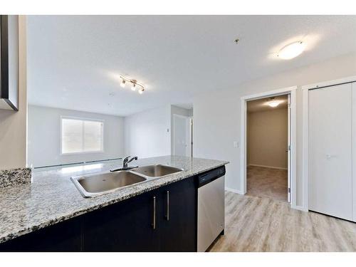 4211-4641 128 Avenue Ne, Calgary, AB - Indoor Photo Showing Kitchen With Double Sink