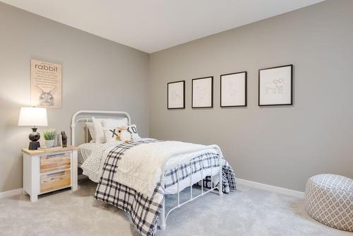 7 Royston Way Nw, Calgary, AB - Indoor Photo Showing Bedroom