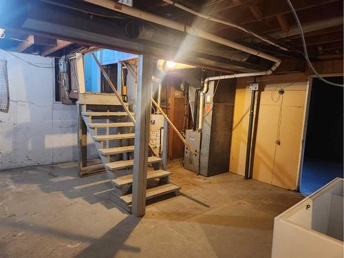 1428 19 Avenue, Didsbury, AB - Indoor Photo Showing Basement