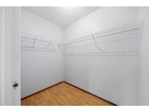 1202 Murdoch Street, Crossfield, AB - Indoor With Storage