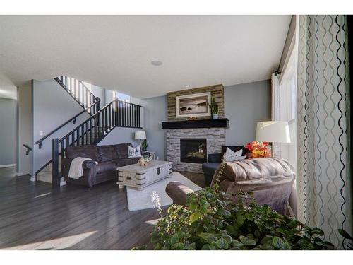 6 Ranchers Bay, Okotoks, AB - Indoor Photo Showing Other Room With Fireplace