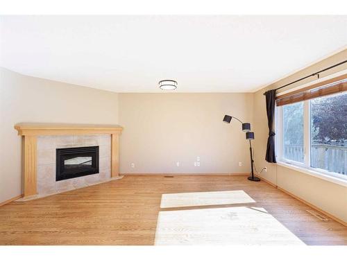 136 Citadel Close Nw, Calgary, AB - Indoor Photo Showing Living Room With Fireplace