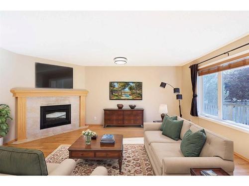 136 Citadel Close Nw, Calgary, AB - Indoor Photo Showing Living Room With Fireplace