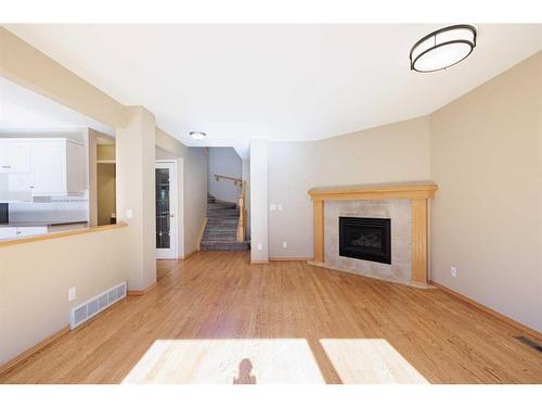 136 Citadel Close Nw, Calgary, AB - Indoor Photo Showing Living Room With Fireplace