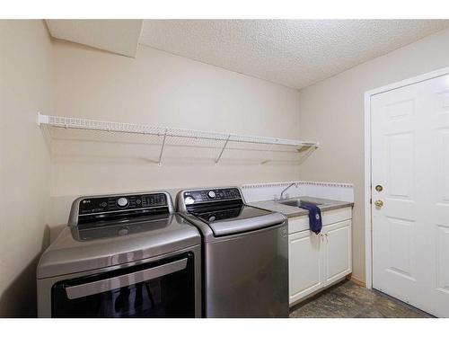 136 Citadel Close Nw, Calgary, AB - Indoor Photo Showing Laundry Room