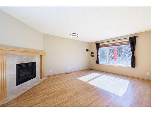 136 Citadel Close Nw, Calgary, AB - Indoor Photo Showing Living Room With Fireplace