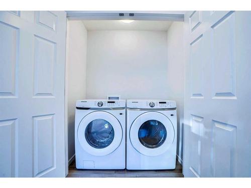 822 Windbury Street Sw, Airdrie, AB - Indoor Photo Showing Laundry Room