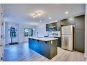 822 Windbury Street Sw, Airdrie, AB  - Indoor Photo Showing Kitchen With Stainless Steel Kitchen With Upgraded Kitchen 