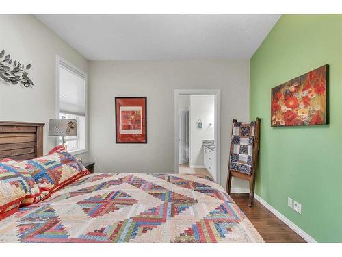 1043 Kings Heights Way Se, Airdrie, AB - Indoor Photo Showing Bedroom