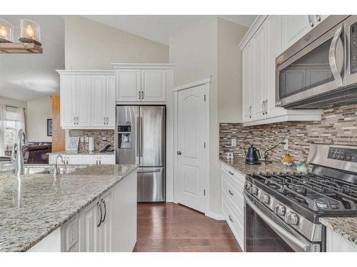 1043 Kings Heights Way Se, Airdrie, AB - Indoor Photo Showing Kitchen With Upgraded Kitchen