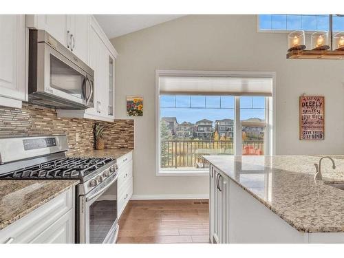 1043 Kings Heights Way Se, Airdrie, AB - Indoor Photo Showing Kitchen With Upgraded Kitchen