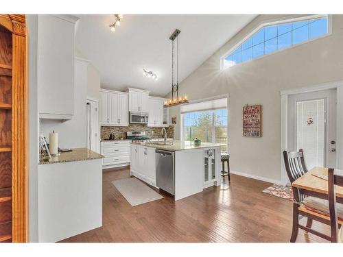 1043 Kings Heights Way Se, Airdrie, AB - Indoor Photo Showing Kitchen With Upgraded Kitchen