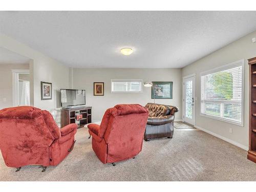 1043 Kings Heights Way Se, Airdrie, AB - Indoor Photo Showing Bedroom