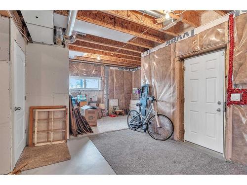 1043 Kings Heights Way Se, Airdrie, AB - Indoor Photo Showing Basement