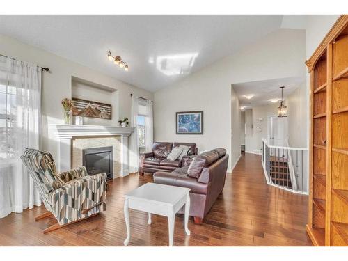 1043 Kings Heights Way Se, Airdrie, AB - Indoor Photo Showing Living Room With Fireplace