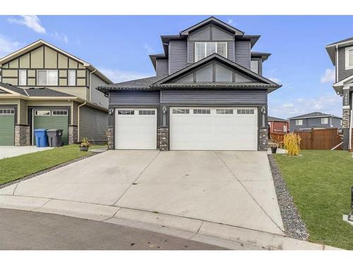 1410 Price Close, Carstairs, AB - Outdoor With Facade