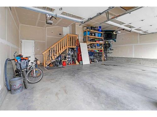 1410 Price Close, Carstairs, AB - Indoor Photo Showing Garage