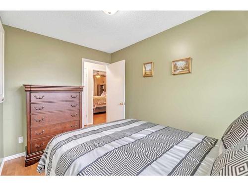 17 Alcock Street, Okotoks, AB - Indoor Photo Showing Bedroom