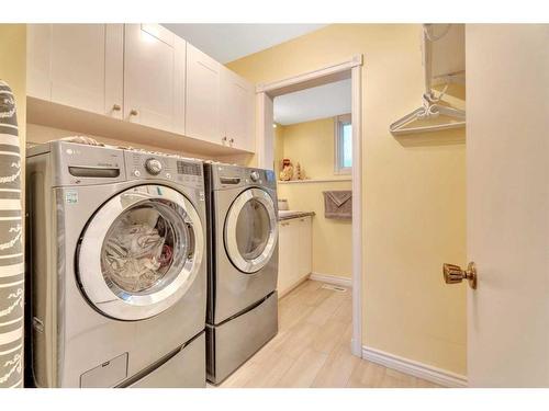 17 Alcock Street, Okotoks, AB - Indoor Photo Showing Laundry Room