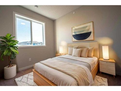 192 Hotchkiss Drive Se, Calgary, AB - Indoor Photo Showing Bedroom