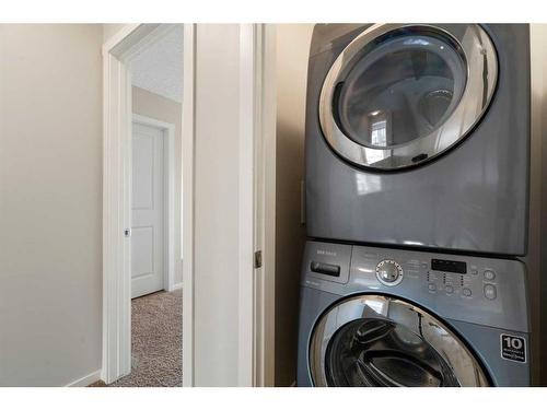 42 Kinlea Common Nw, Calgary, AB - Indoor Photo Showing Laundry Room