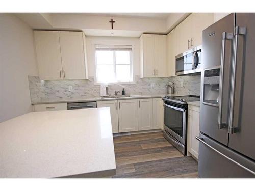 1415-298 Sage Meadows Park Nw, Calgary, AB - Indoor Photo Showing Kitchen With Upgraded Kitchen