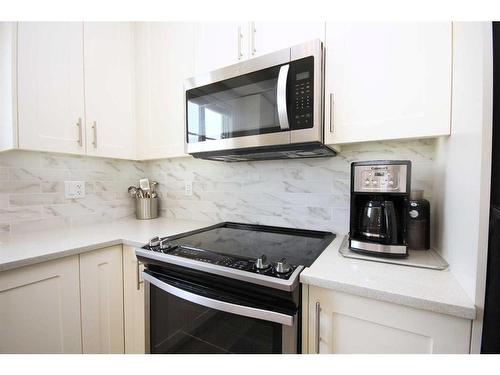 1415-298 Sage Meadows Park Nw, Calgary, AB - Indoor Photo Showing Kitchen