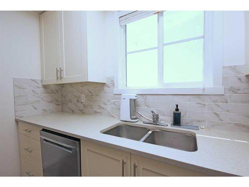 1415-298 Sage Meadows Park Nw, Calgary, AB - Indoor Photo Showing Kitchen With Double Sink