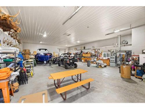 33550 Range Road 23, Rural Mountain View County, AB - Indoor Photo Showing Garage