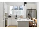 221 Heirloom Way Se, Calgary, AB  - Indoor Photo Showing Kitchen 