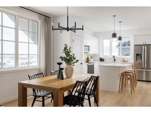 221 Heirloom Way Se, Calgary, AB - Indoor Photo Showing Dining Room