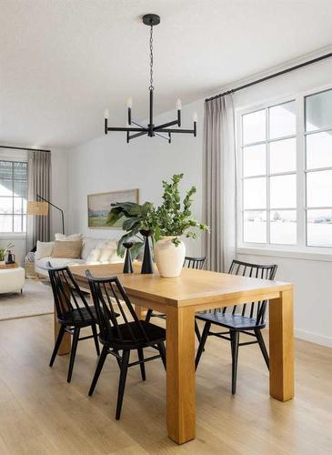 221 Heirloom Way Se, Calgary, AB - Indoor Photo Showing Dining Room